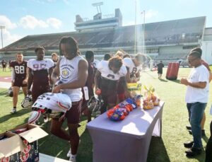 Missouri State BSU hands out snacks to football team, band